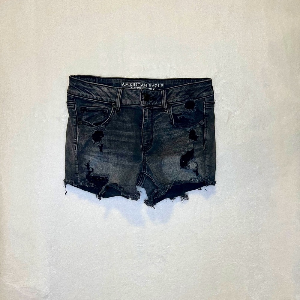 Black jean shorts with rips